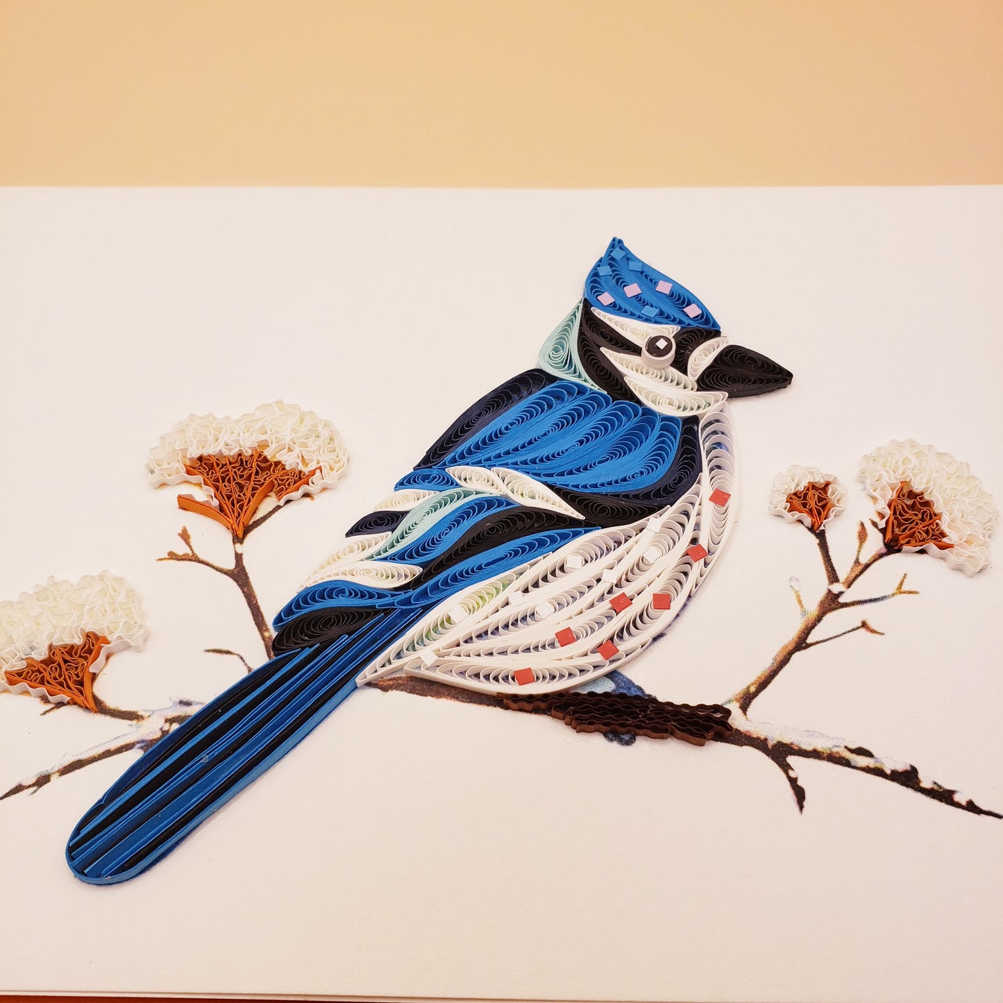 Blue Jay on a Snowy Branch